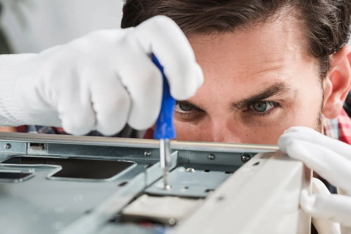MERGE field engineer servicing an aesthetic laser device in Dubai